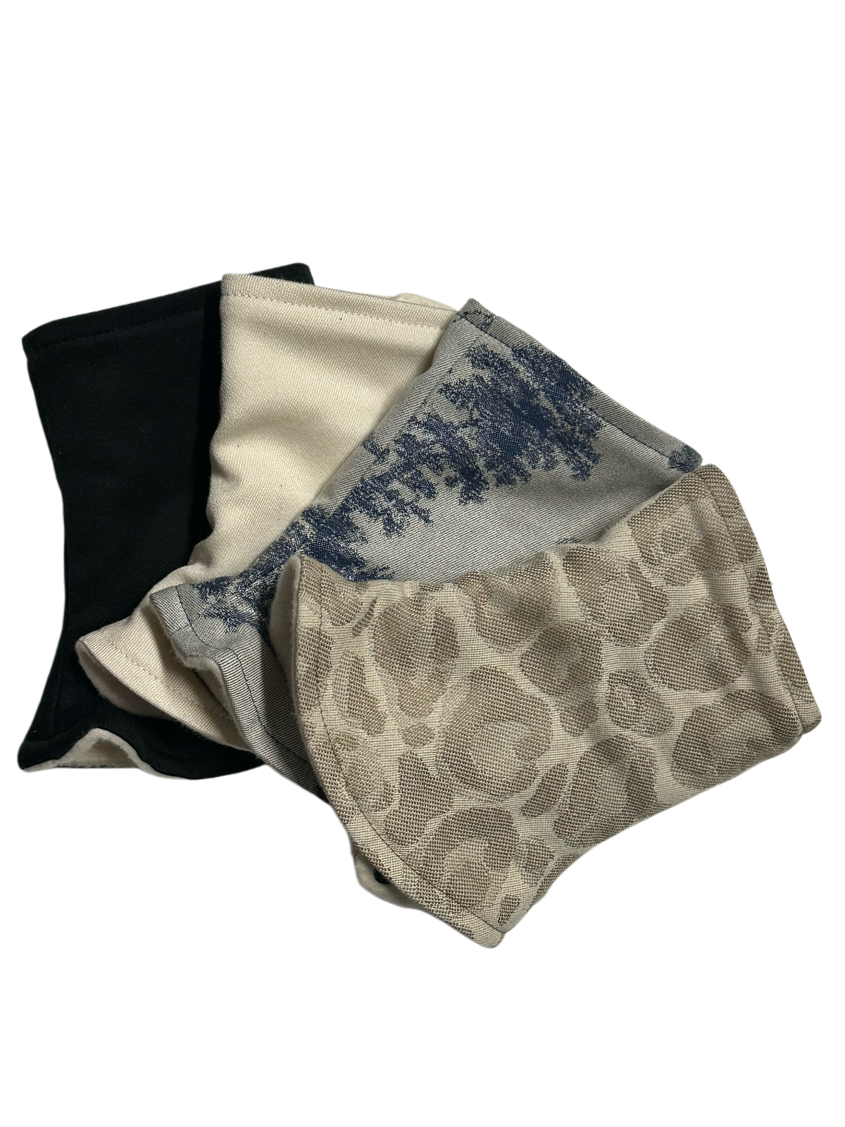 Gepolsterte Schulterpads in vier Stoffen: Schwarz, Natur Beige, Toile de Jouy und Leopardenmuster.